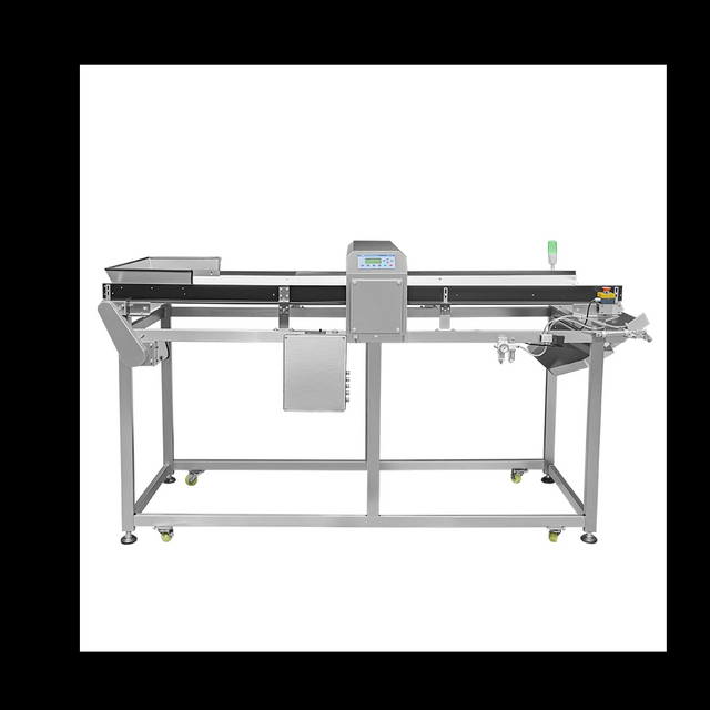 Détecteur de métaux avec rejet de rabat pour matériaux en vrac