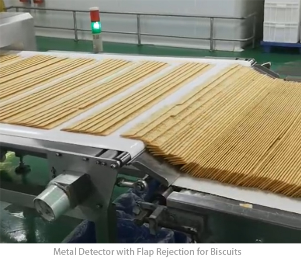 D&eacute;tecteur de m&eacute;taux avec rejet de rabat pour biscuits